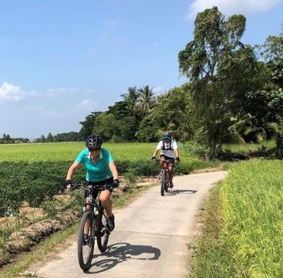 Janet & Mark Basi Cycling on the  tour with redspokes